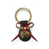 a key chain with a bow