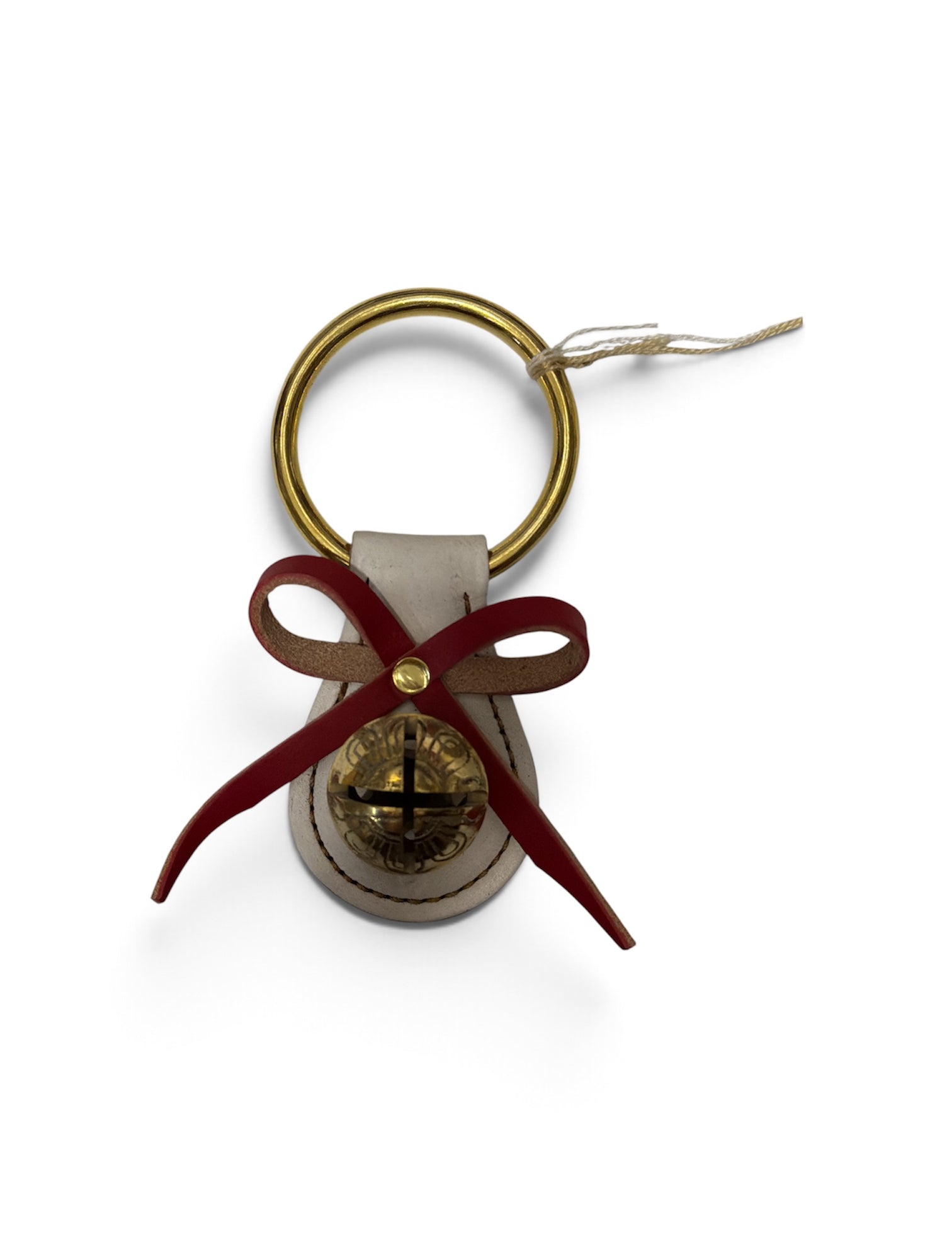a key chain with a bell and a bow