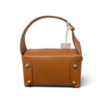a brown leather bag with a white tag