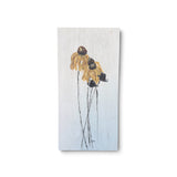 a painting of flowers on a white surface