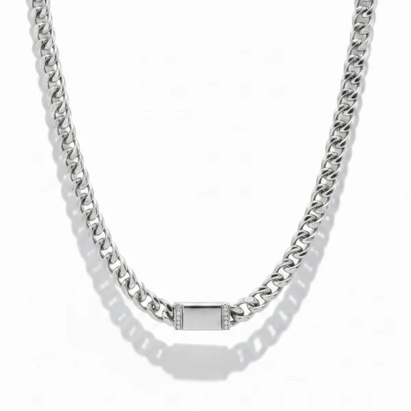 a silver chain with a square object on it
