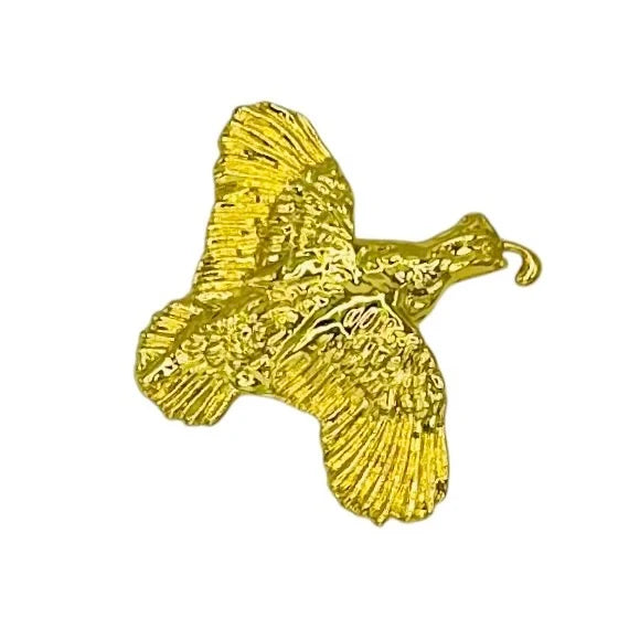 a gold bird with wings