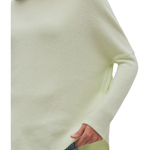 a person wearing a white sweater