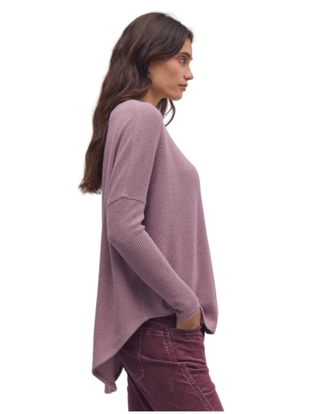 a woman in a purple sweater