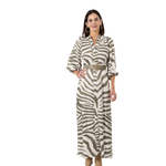 a woman in a zebra print dress