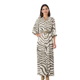 a woman in a zebra print dress