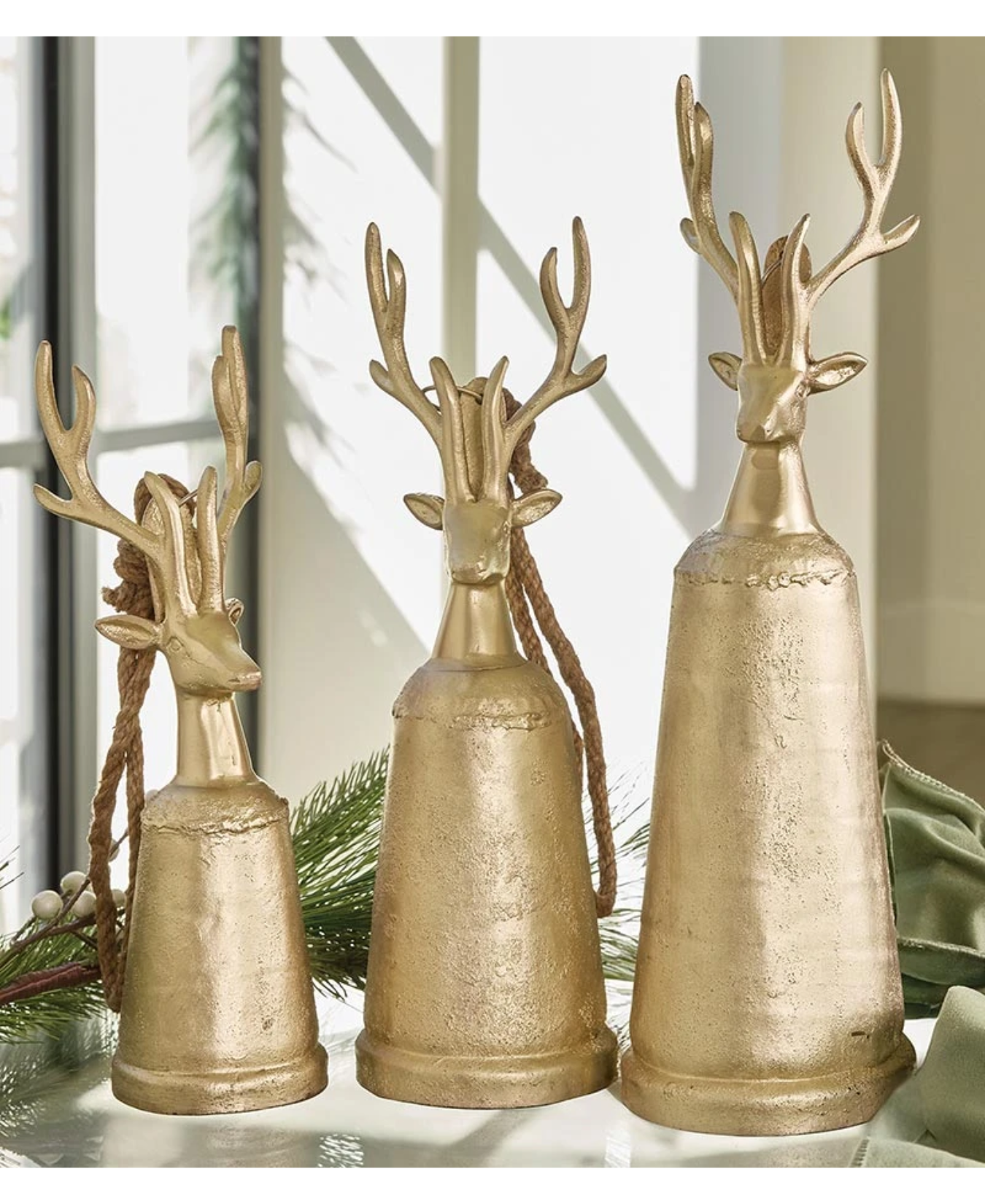 a group of gold reindeer bells