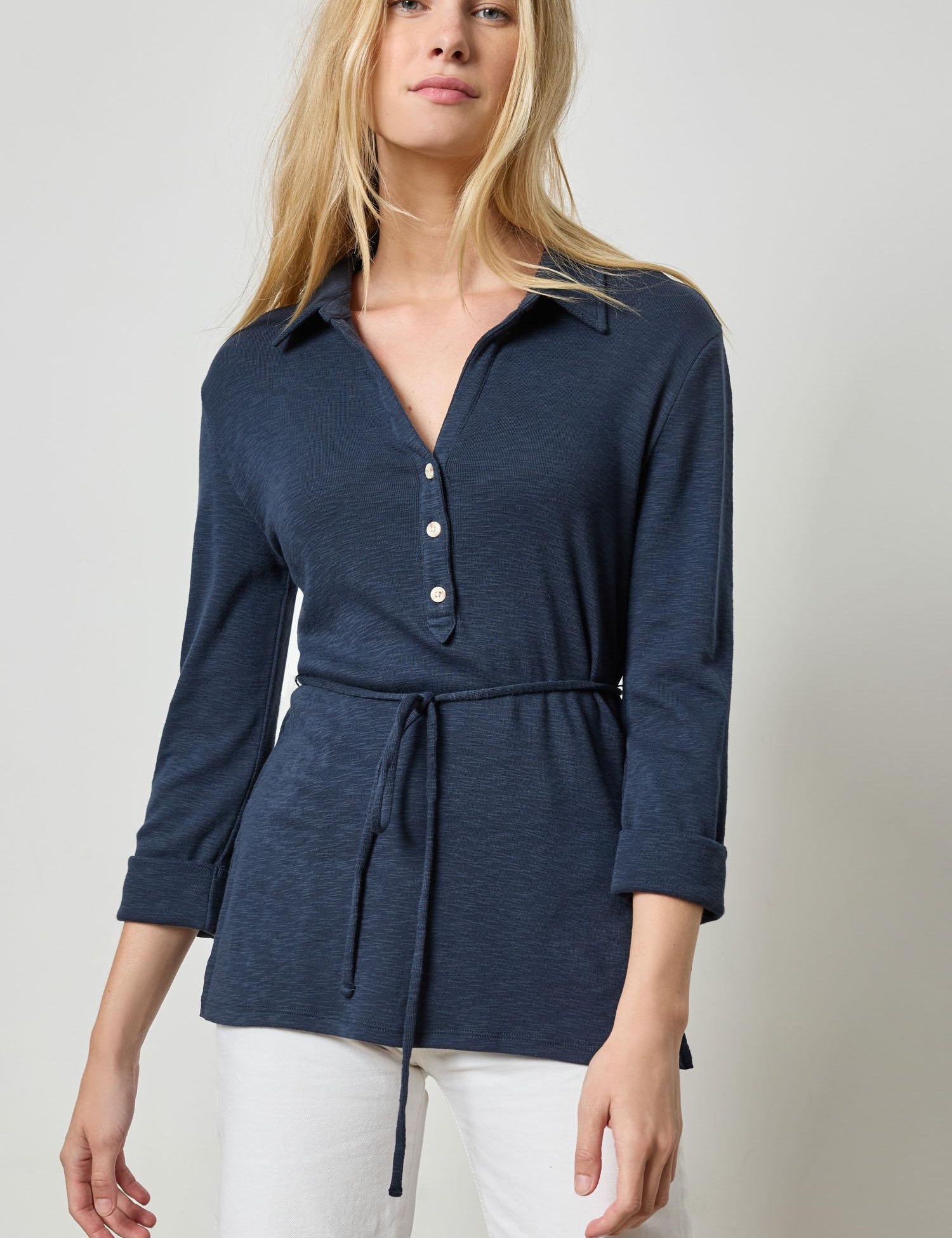 a woman wearing a blue shirt
