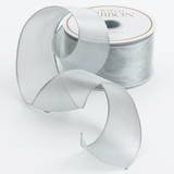 a roll of silver ribbon