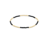 a black and white beaded bracelet