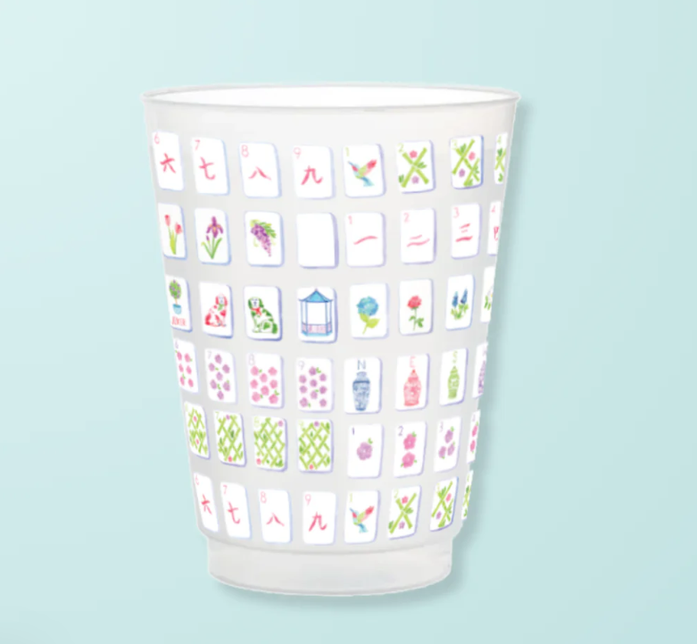 a cup with many images on it