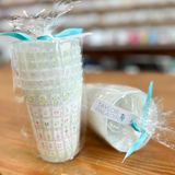 a cup in plastic wrap