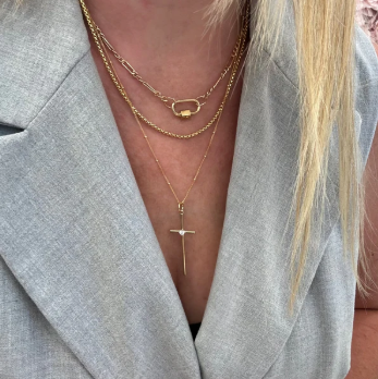 a woman wearing a necklace