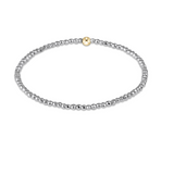 a silver and gold beaded bracelet