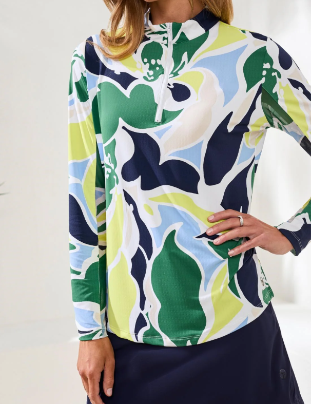 a woman wearing a colorful shirt