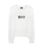a white sweater with black text
