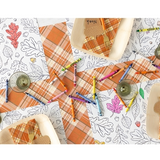 a table with plates and crayons