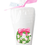 a stack of plastic cups tied with a bow
