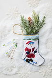 Slopeside Santa Skiing