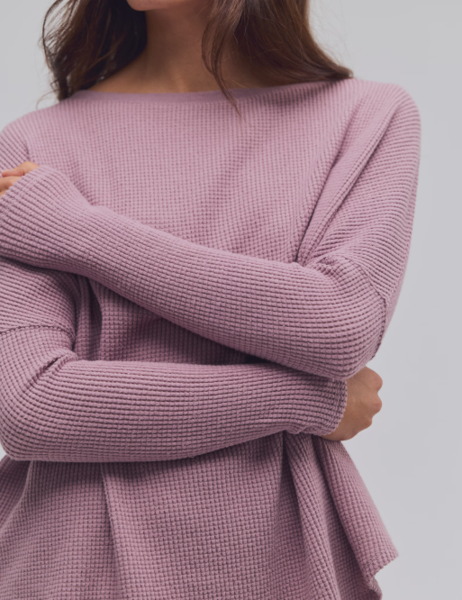 a person with arms crossed
