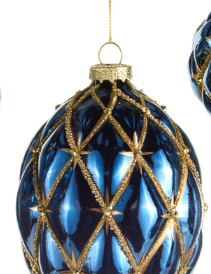 a close-up of a blue and gold ornament