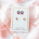a pair of earrings in a package