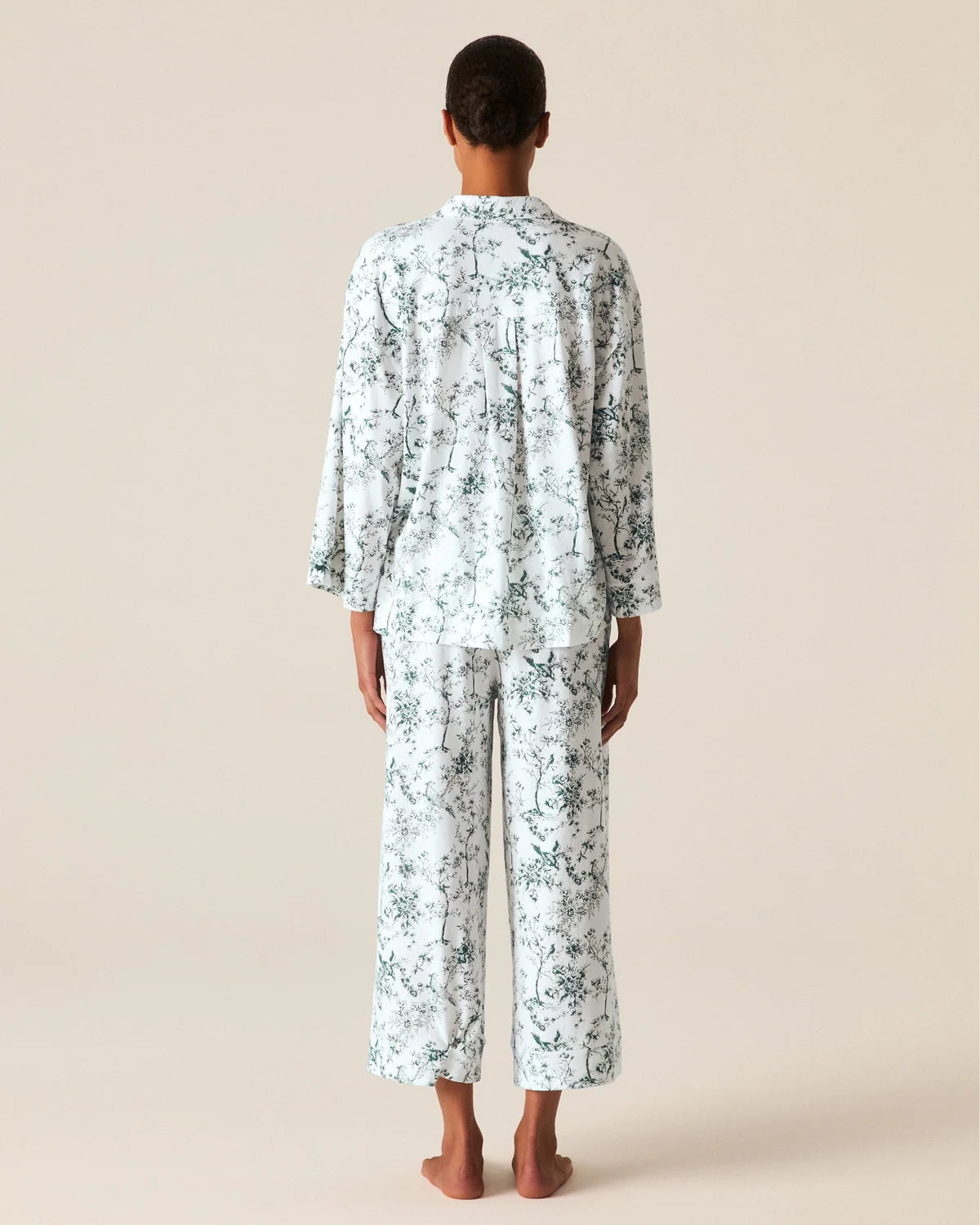 a woman in a white pajama