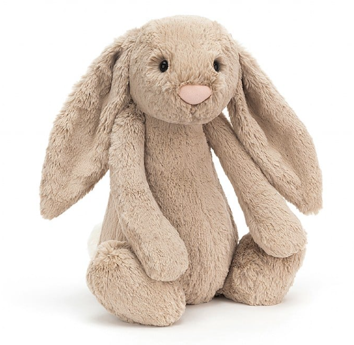 a stuffed animal rabbit on a white background
