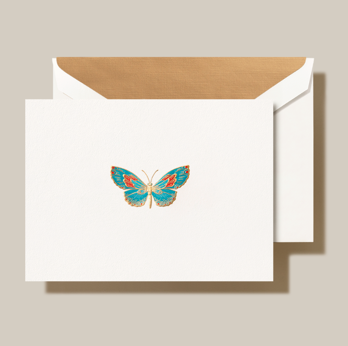 a white envelope with a butterfly on it