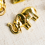a gold elephant and other objects