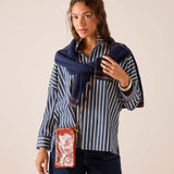 a woman in a striped shirt