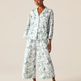 a woman wearing a white pajama