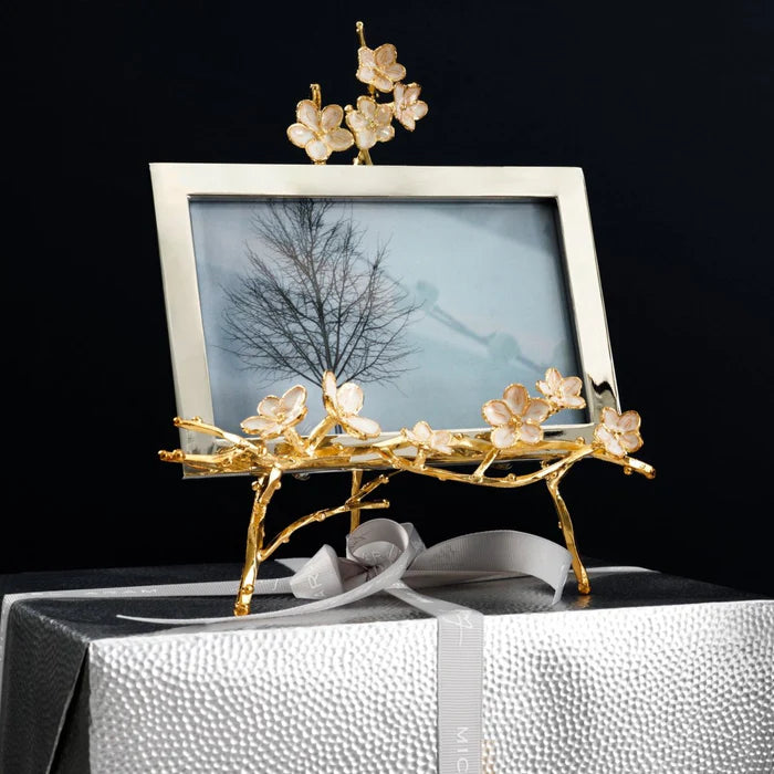 a picture frame on a silver present