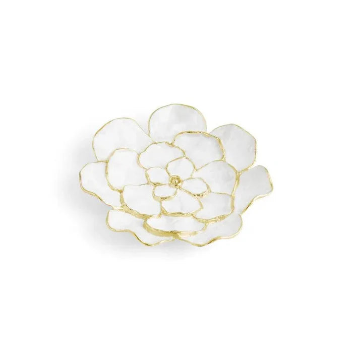 a white and gold flower