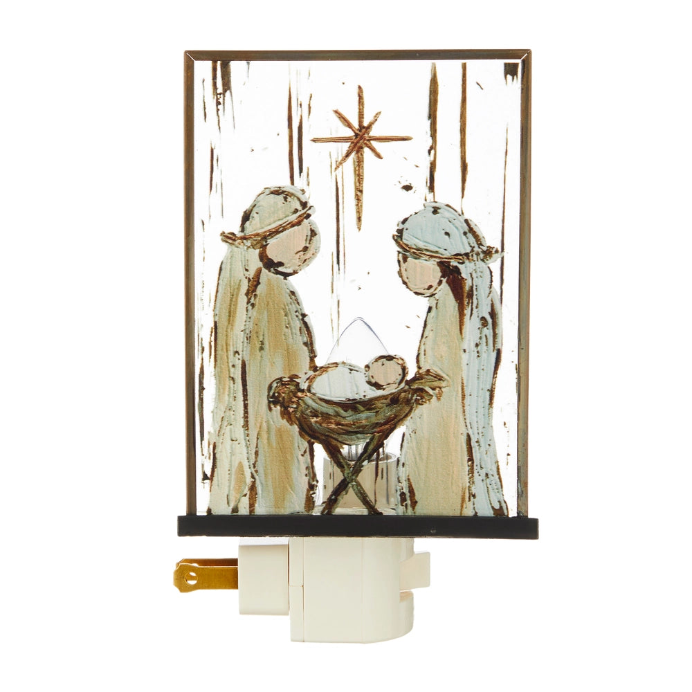 a night light with a picture of the nativity scene