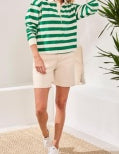 a woman in a green and white striped shirt