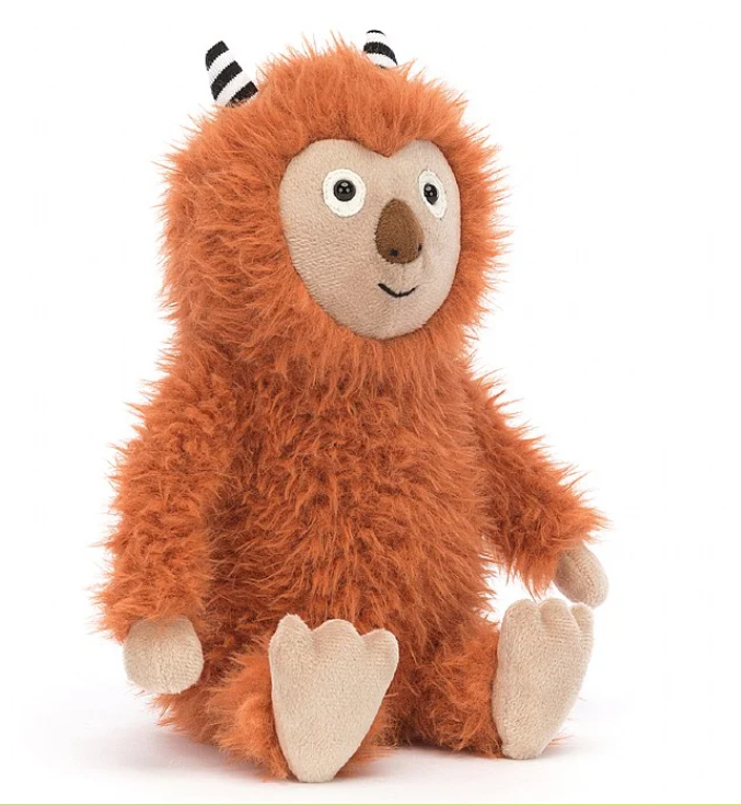 a stuffed animal toy sitting