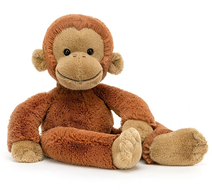 a stuffed animal monkey on a white background